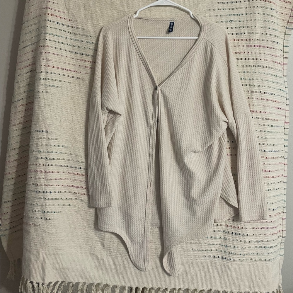 Large cream colored cardigan